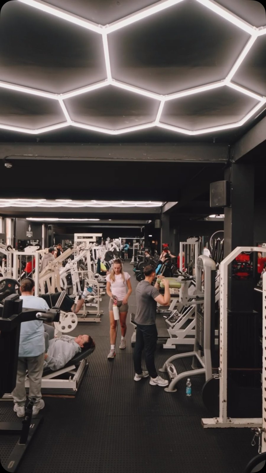 Marine House gym floor under hexagon LED ceiling lights